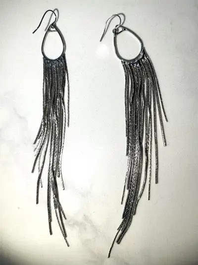 Costume jewelry earrings. Like new. Cash only.