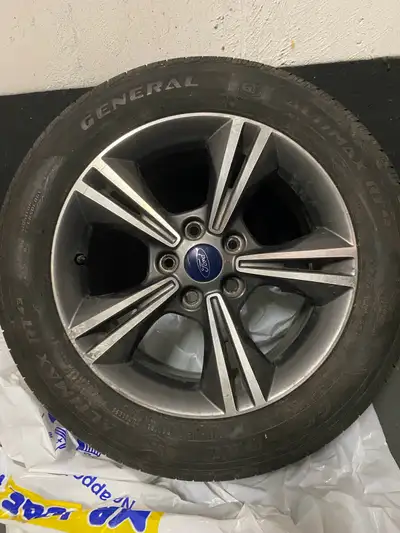 Aluminum Ford rims and Michelin tire set of 4 good tred