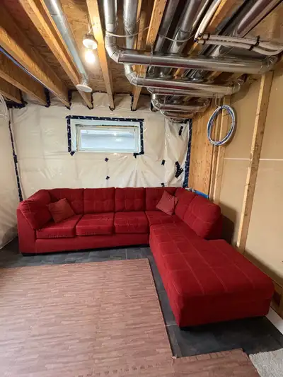 Red sectional couch. In very good condition. It’s been in our basement so it’s been barely used! Fro...