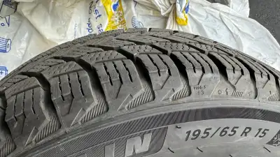 4 Michelin X-Ice Snow Winter Tires and Rims Tire Size: 195/65 R15 Tires are basically new. Used a co...