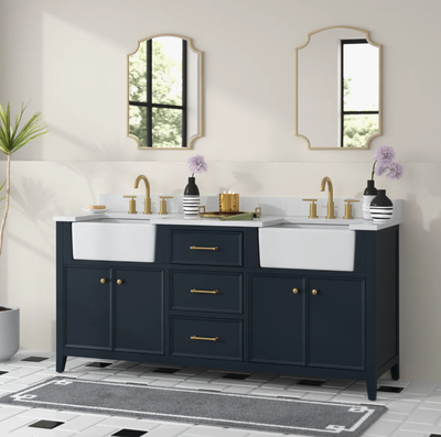 This double vanity comes with two white ceramic apron sinks. White stone countertop and a matching s...