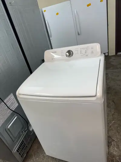 This is a used Samsung top load washing machine in good condition. It has a diamond drum, multiple w...