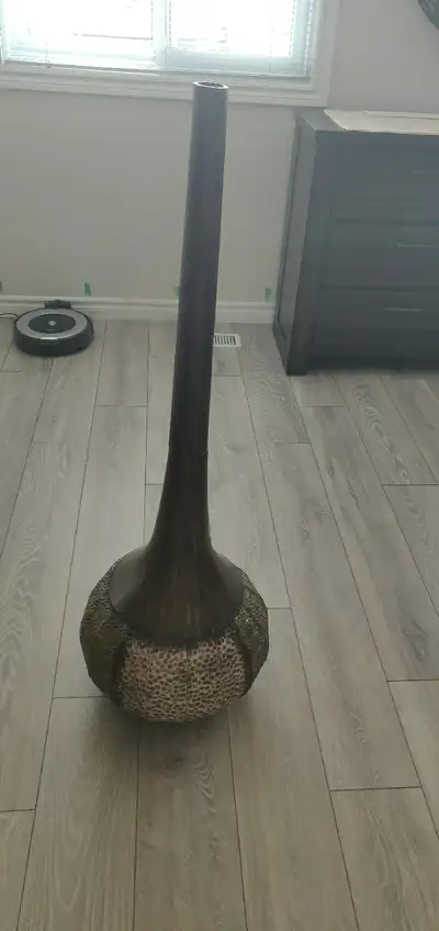 Pier 1 metal floor vase. The floor vase measures 4' in height.