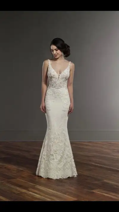 Style #888 "Modern, romantic and sexy, this mermaid wedding dress from Martina Liana has it all! The...