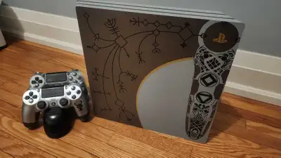 Well loved console in great condition! 1 terabyte, cables included, bundled GoW controller plus one...