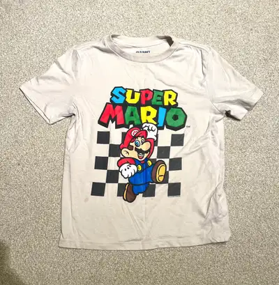 Selling an Old Navy brand size 8 (M) Super Mario tee shirt. Shirt is in used but gentle condition. F...