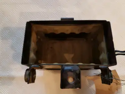 1985 125m Honda ATC battery box. Item is in great condition and has very little rust and has not bee...