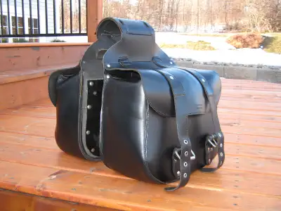 FOR SALE- Custom made leather adjustable saddlebags. They measure 12"High by 13"Long by 7"Wide. They...