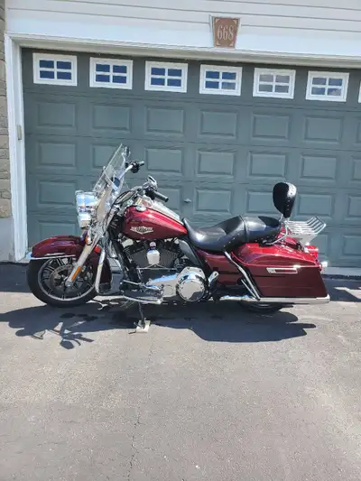 I'm selling my used 2014 Harley Davidson Road King, a touring motorcycle known for its comfort and c...