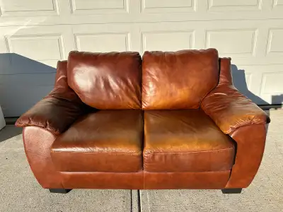 Caramel colored REAL leather loveseat…ONLY $150, View more