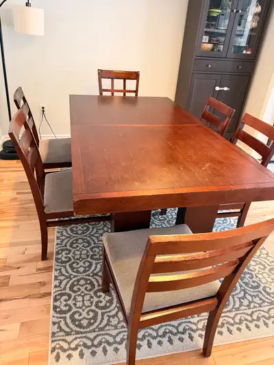 Solid Dark wood Dining Table with extendable leaf and 5 chairs, View more