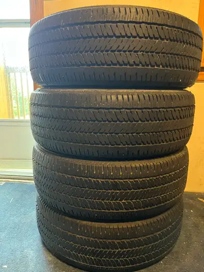 Selling a set of four 265/65R17 Bridgestone all-season tires that are in used condition and ready fo...