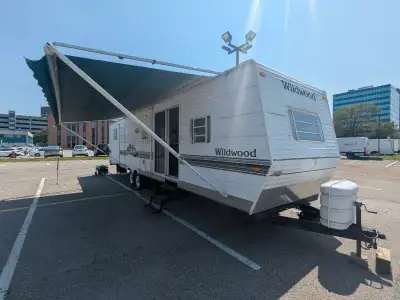 2004 Forest River Wildwood 37 bhss Older model trailer but in good condition 12-Ft power slide out w...
