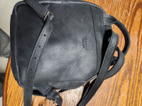 Like new Roots backpack purse.   $250 obo