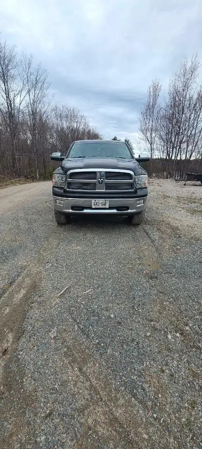 2011 Dodge Ram 1500 5.7 Hemi. Back rack and it has 6 inch lift kit and kicker bars. Needs a good bod...