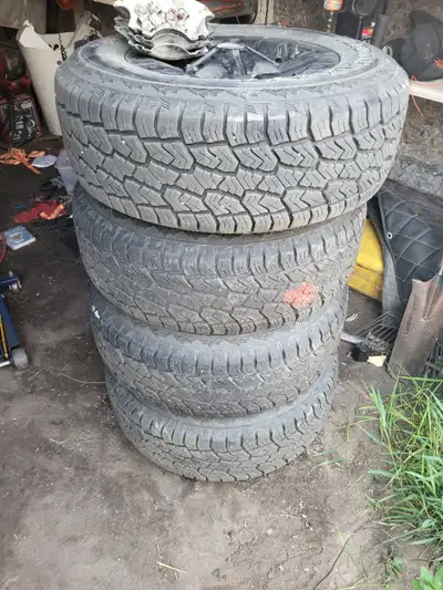 265/70R17 tires for chevy truck. Basically new. 6 bolt rims. Teramax a/t Call Anthony @ 639-533-3861...