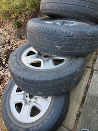 4 Toyo All Season tires with 5 bolt rims
