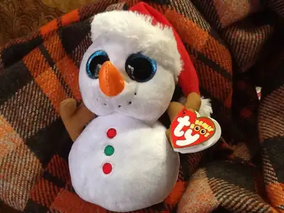 Scoop is brand new in box with his tags.Stands 9" tall. Pick up in Oshawa.