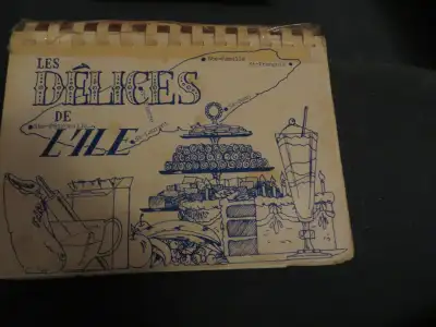 Livre de Cuisine. Titre ; - Les Délices de l'Ile d'Orléans. - 252 pages. Prix ; 10.00$. Bonne condit...
