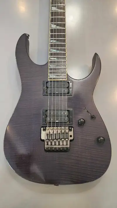 The RGT42DXFM features neck through body construction with mahogany body wings and a flamed maple to...
