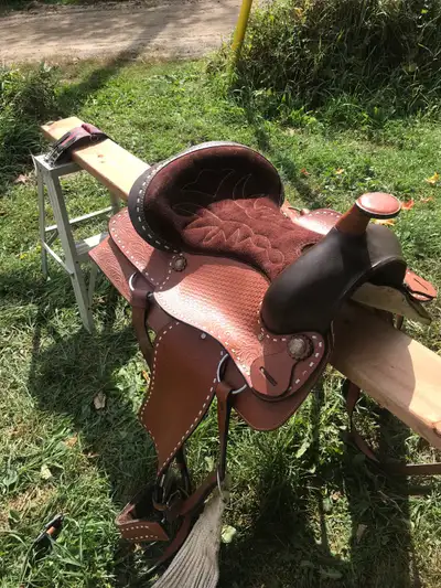 15 inch western 3 new 1 old plus new bridles, View more