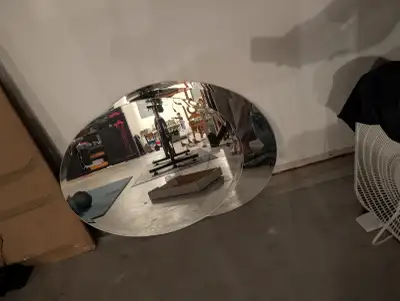 Two oval beveled mirrors, View more