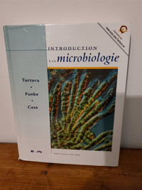 Livre introduction à la microbiologie Tortora funke case