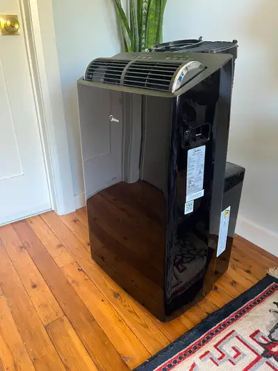 Like new (only used for a year) Midea 12000 BTU DUO Smart Inverter Portable AC (Air Conditioner). Mo...