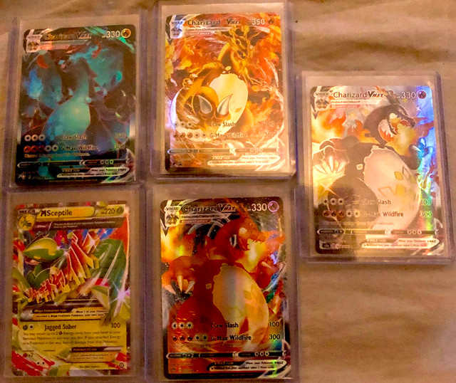 Charizard Pokémon cards ultra rare rainbow hidden gates etc in Toys & Games in London