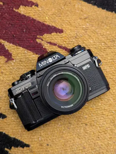 I'm selling a used Minolta X-700 film SLR camera, perfect for anyone looking to get into film photog...