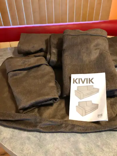 This is a brand new cover for the Kivik couch series. Great to have an extra one on hand for spills...