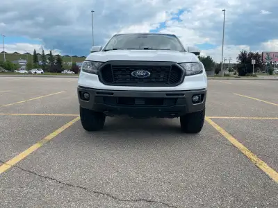 Up for sale 4*4 Ford Ranger Lariat top-of-line model holding Rebuilt Status. 2.3L EcoBoost engine 27...