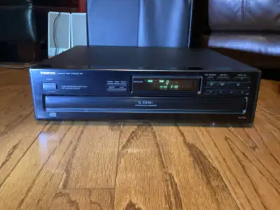 ONKYO DX C206 CD CHANGER PLAYER IN VERY GOOD WORKING CONDITION. SOLID UNIT. DOOR CAN BE OPEN DURING...
