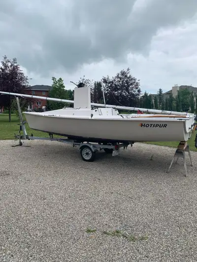 Hotfoot 20 and EZ Loader trailer for sale, sailed and raced for 3 seasons on Sylvan Lake. All clean...