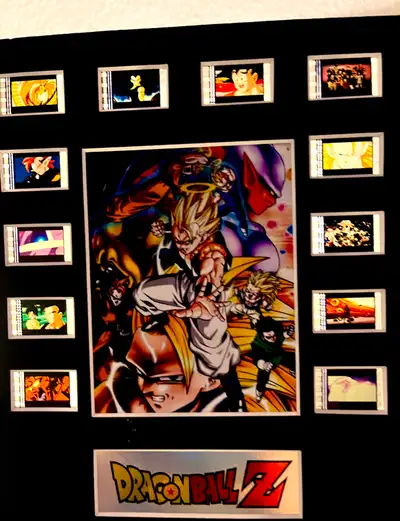 This striking Dragon Ball Z cel display features a vibrant central image surrounded by individual an...