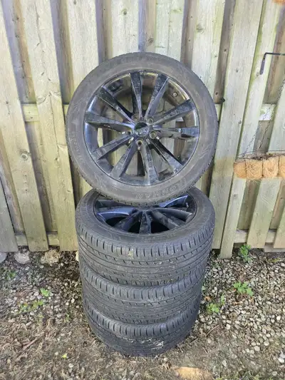 Ironman tires size 225/50ZR18 and Dodge rims came off a Dodge Avenger