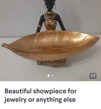 This artistic jewelry holder is a new and unique way to display your treasured items, featuring a st...