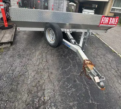 Like new skidoo trailer. Tilts for easy loading. Only used a handful of times. Well kept. Asking 300...