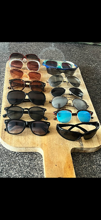 Sunglasses. Lots to choose from, $10 each