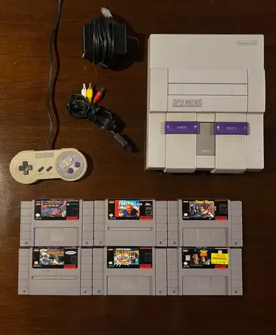 Relive the glory days of 16-bit gaming with this used Nintendo Super Nintendo Entertainment System (...
