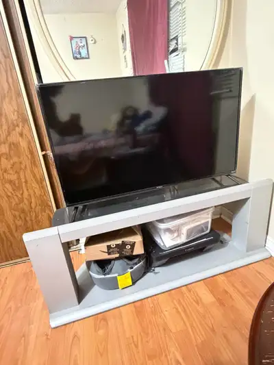 Roku TV 35” with TV Stand, View more