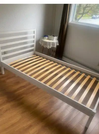 Ikea twin bed like new., View more