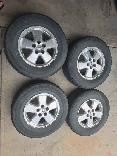 I am selling a set of four used Ford Escape rims and tires. These rims and tires came off a 2008 For...