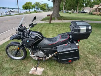 Excellent bike ,new tires,chain,bags and tourpack ,corbin seat and heated grips. Lowered 2 inches.Se...