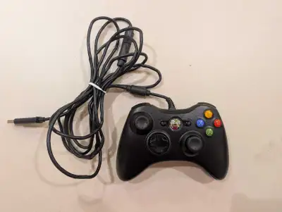 Pre-owned, moderately used Xbox 360 controller. Have two for sale @ $20 each. Please consult images...