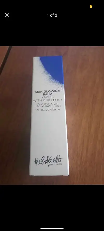 This is a NEW Estee Lauder Skin Glowing Balm Makeup with Pink Peony, offering a natural, even-toned,...