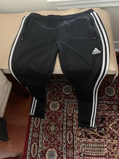In excellent condition With zip pockets Zip bottom legs