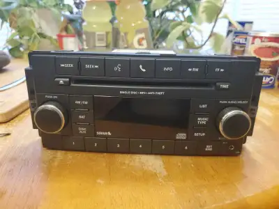 This used factory stereo is a working replacement unit that fits various Jeep, Dodge, and Chrysler m...