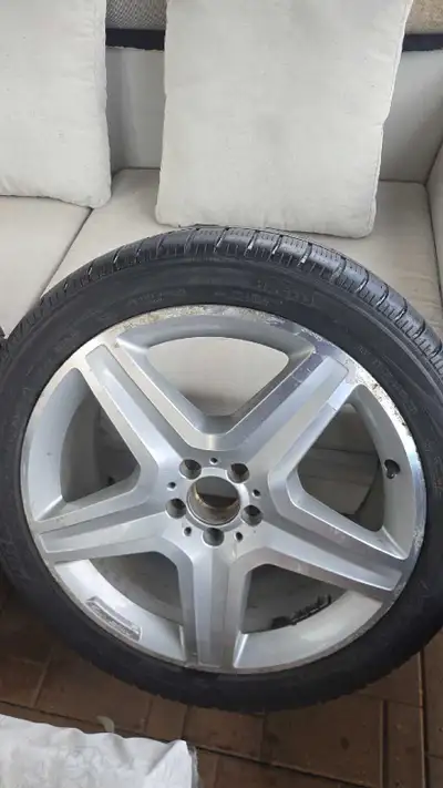Selling a set of 4 genuine Mercedes AMG wheels with Pirelli winter tires. Specs: OEM Mercedes AMG wh...