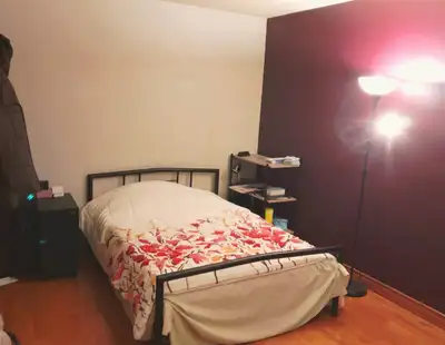 Spacious room with a closet and separate entrance to back deck for rent. Available July1st. The hous...